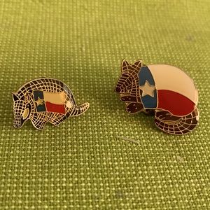 Two Texas armadillo enamel lapel pins